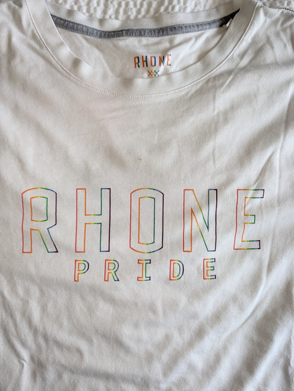 RHONE White Tee with Multicolor Outline Lettering